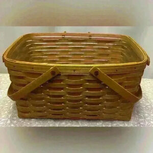 Longaberger Vintage 1992 Woven Slat Basket with Handles measures 8 1/2X14 1/2X10